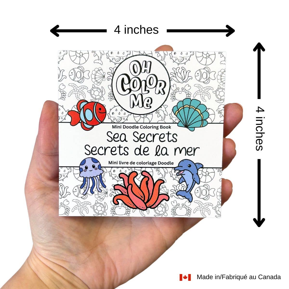 Coloring book titled 'Oh Color Me' held in a hand with dimensions indicated.